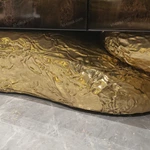 Luxury TV Stand with Bold Stone Top Textured Dark Finish Sculptural Stainless Steel Base and Cabinet Storage